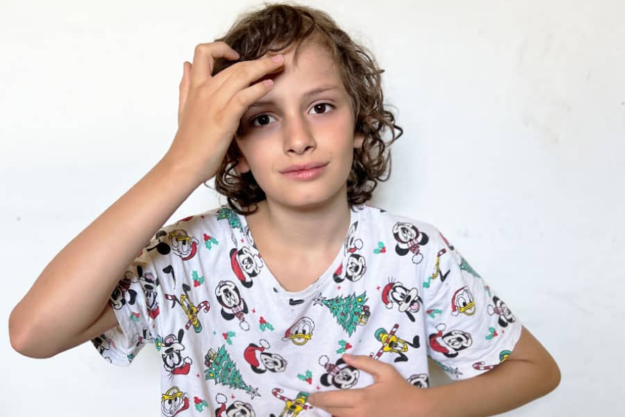 boy signing in ASL - take Mr. D Math's ASL II online classes to learn ASL